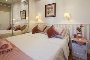 Posteľ alebo postele v izbe v ubytovaní Apartments Florence - Angel's Loft