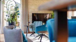Un lugar para sentarse en Sonne 1806 - Hotel am Campus Dornbirn