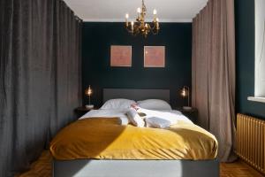 Postel nebo postele na pokoji v ubytování Schickes Boutique-Apartment, zentral in Messe-& Bahnhofsnähe, sehr ruhig & gratis Parkplatz - HappyStay