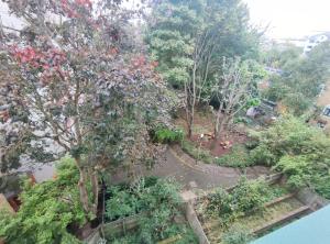 an aerial view of a garden with trees and flowers at 3 BEDROOM FLAT IN CENTRAL LONDON - REGENTS PARK / BAKER ST in London
