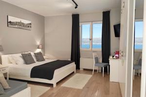 Postel nebo postele na pokoji v ubytování Hotel Korsal