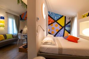 Postel nebo postele na pokoji v ubytování Bocelli Guest House