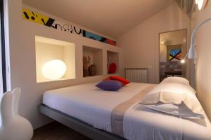 Postel nebo postele na pokoji v ubytování Bocelli Guest House