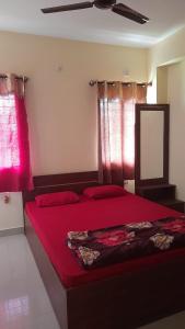 A bed or beds in a room at Sukhshanthi- Luxury Retirement Home