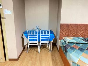 Postel nebo postele na pokoji v ubytování Sundale Hotel