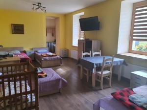 TV a/nebo společenská místnost v ubytování Vecais cels 25C