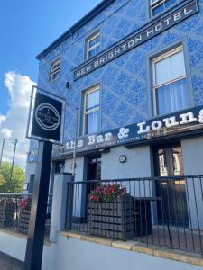 a blue and white building with a bar room at The New Brighton Hotel in New Brighton