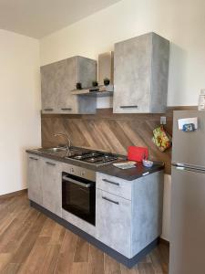 A kitchen or kitchenette at Villa Daniele