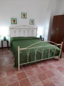 Lova arba lovos apgyvendinimo įstaigoje Il Baglio di donna Rosa