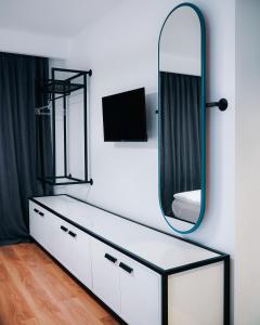 TV a/nebo společenská místnost v ubytování Kazbegi Apartments