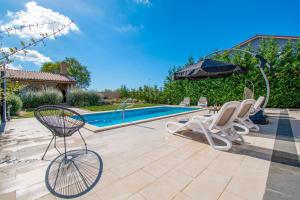 Bazén v ubytovaní VILLA Moki mit privatem beheizbarem Pool alebo v jeho blízkosti