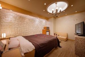 TV a/nebo společenská místnost v ubytování Hotel Metro (Adult Only)