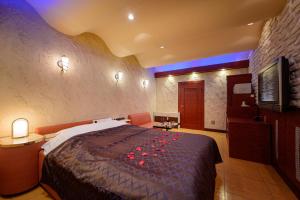 Postel nebo postele na pokoji v ubytování Hotel Metro (Adult Only)