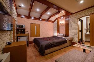 Postel nebo postele na pokoji v ubytování Hotel Metro (Adult Only)