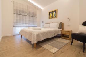 Ένα ή περισσότερα κρεβάτια σε δωμάτιο στο Villa Ema with heated saltwater pool, sauna and private gym - by TA Leut Agency +47 φωτογραφίες