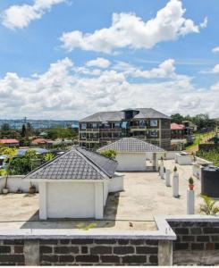 a view of a building with two roofs at RUPITAL SUITE's in Nakuru