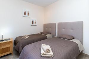 Posteľ alebo postele v izbe v ubytovaní Duplex apartment Estepona