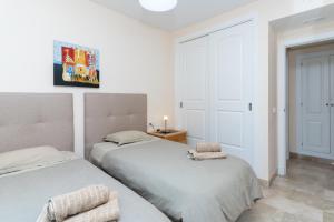 Posteľ alebo postele v izbe v ubytovaní Duplex apartment Estepona