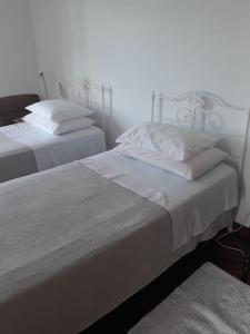 Postel nebo postele na pokoji v ubytování Rooftop Apartment + 10 fotografií