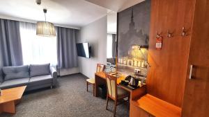 Posezení v ubytování Hotel Malinowski Economy