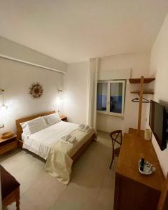 Postel nebo postele na pokoji v ubytování B&B Al tramonto Otranto