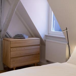Postel nebo postele na pokoji v ubytování bellasBnB an der Jagst