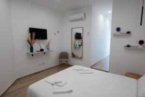Posteľ alebo postele v izbe v ubytovaní All'Uscita B&b