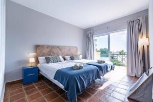 Кровать или кровати в номере Sur Suites Miraflores