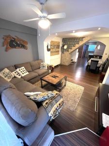 a living room with a couch and a table at Big DREAMS apartment in Zagreb