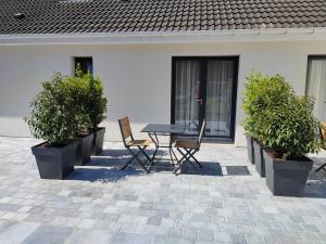 Patio nebo venkovní prostory v ubytování Art de l'Ô chambre d'hôtes
