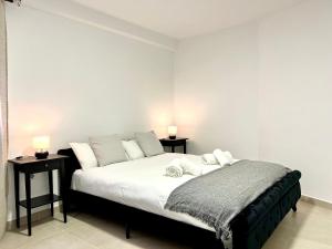 Posteľ alebo postele v izbe v ubytovaní Scala & balcony by ELE Apartments