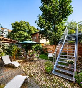 Aed väljaspool majutusasutust Michaelis Suite - Schrangen-Suites-1389