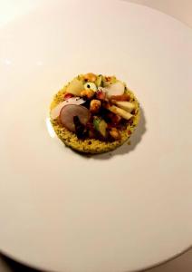 a small pastry on a white plate at Villa Cigolotti in Vivaro +138 photos