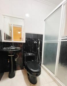 Ванна кімната в Hotel Pensión Anduriña