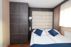 Cama ou camas em um quarto em Willa Nova