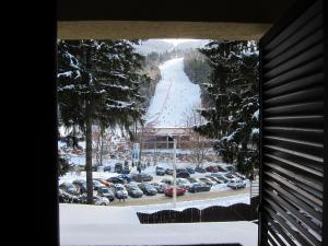 a view from a window of a parking lot at № 32 in Azuga
