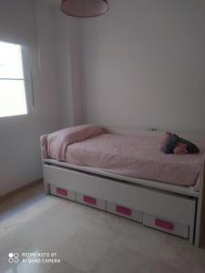 Posteľ alebo postele v izbe v ubytovaní GRAN GOLF BENALMADENA