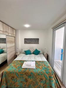 Llit o llits en una habitació de Ushuaia Extremo Sur