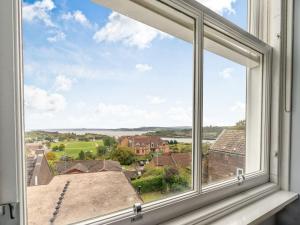 a window view of the countryside from a house at Bay View - Uk38589 in Inverkeithing