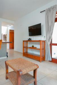 TV at/o entertainment center sa Delluz Bahia Azul 4B Pool view, Jaco Beach 2nd floor