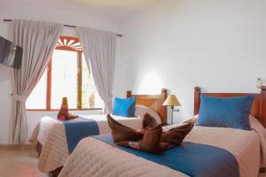 Postel nebo postele na pokoji v ubytování Delluz Bahia Azul 4B Pool view, Jaco Beach 2nd floor