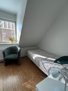 Ein Bett oder Betten in einem Zimmer der Unterkunft Hostel Ingeri