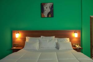 Postel nebo postele na pokoji v ubytování Dialali Hôtel Nouakchott