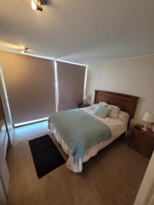 מיטה או מיטות בחדר ב-Hermosa casa en Bahía inglesa 3 habitaciones
