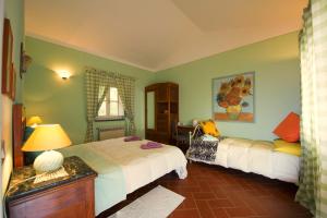 Posteľ alebo postele v izbe v ubytovaní B&B Il Trebbio