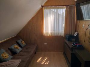 Et opholdsområde på Casa amplia y comoda en Puerto Montt