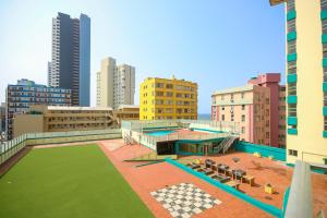 a view of a city with buildings and a tennis court at 10South in Durban