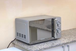 a toaster oven sitting on top of a counter at 10South in Durban