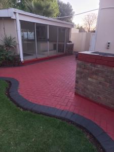 a brick driveway in front of a house at 26 Zea avenue Arcon Park Guest House in Vereeniging