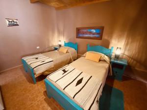 Letto o letti in una camera di Hostal Katari